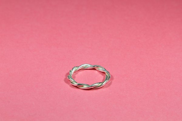 Delicate relaxed twist ring product